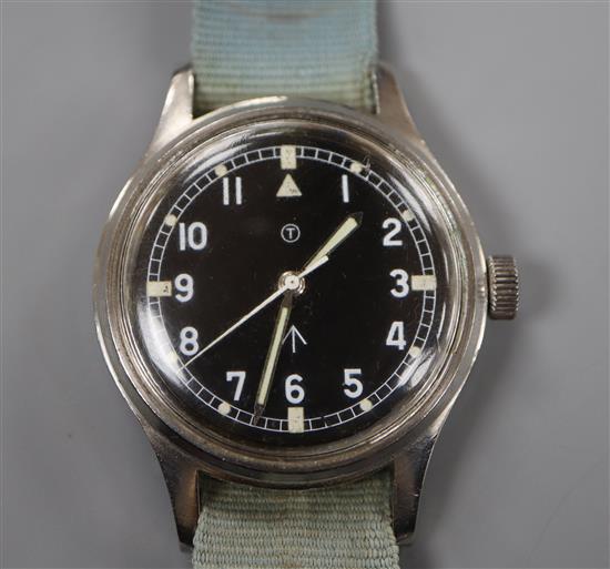 A gentlemans mid 20th century stainless steel military black dial manual wind wrist watch,